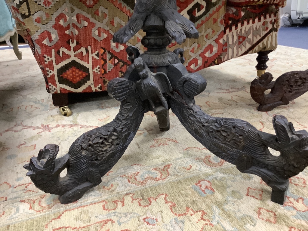 A near pair of 19th century Indian padouk tripod tables, 62cm diameter, height 70cm